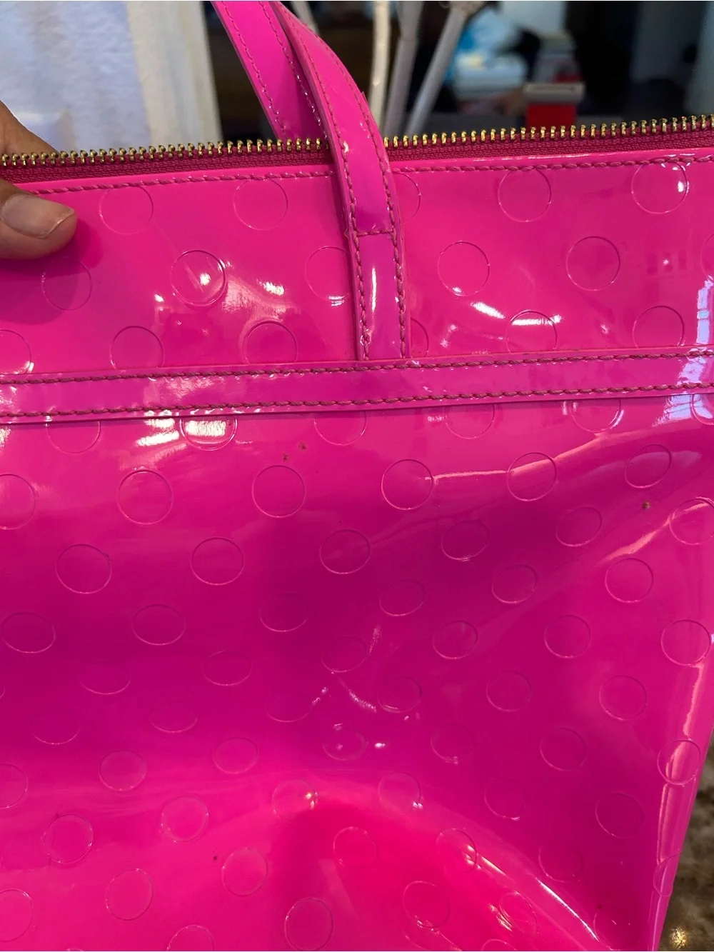 kate spade camellia st Sophie Tote in Hot Pink has a few marks scuffs peeling